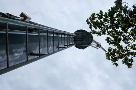scaffolding ladder against brick wall / industrial backgroundの写真素材