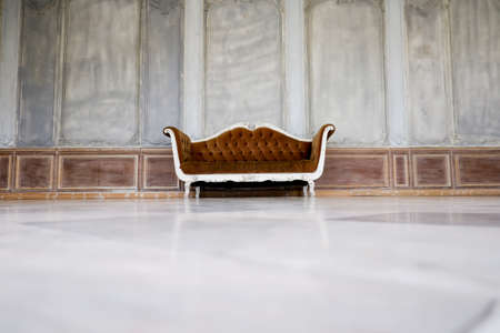 An old abandoned chair left in an abandoned dilapidated building. Interesting how the colors of the...