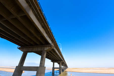 The Yellow river bridge with blue sky in Zhengzhou, Henan province, middle of China.It is a part of the old 107 national road.のeditorial素材