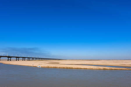 The Yellow river bridge with blue sky in Zhengzhou, Henan province, middle of China.It is a part of the old 107 national road.の写真素材