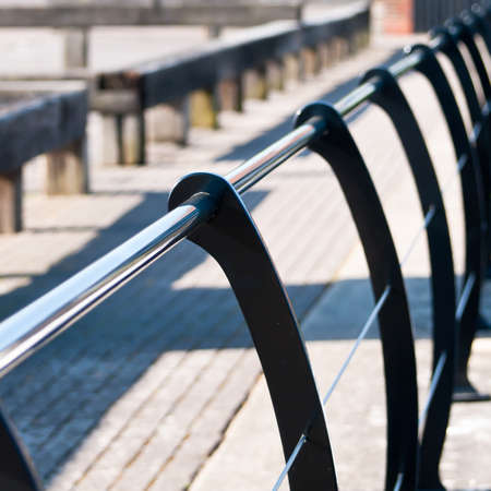 A fence sweeps diagonally across the frame.