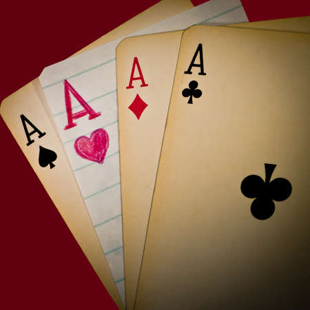 A winning hand of four aces - one of them handmade!の写真素材