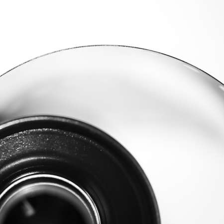 An abstract shot of film emerging from a film cannister.