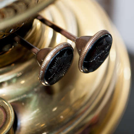 An old antique brass oil lamp.