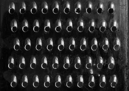 An abstract shot of a cheese grater の写真素材