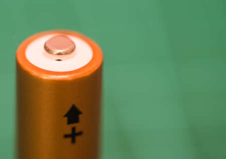 A macro shot of the positive terminal of a single battery.の写真素材