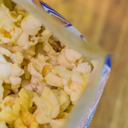 A macro shot of some popcorn in a bag.の写真素材