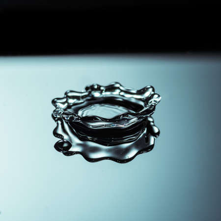 An abstract macro shot of a flat water crown 