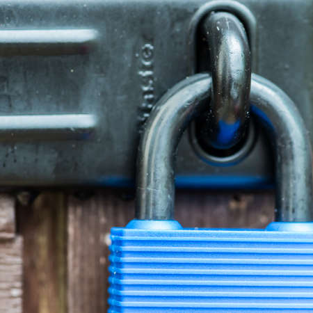 A macro shot of a padlock and hasp.の写真素材