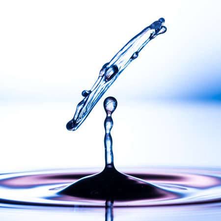 An abstract macro shot of a water drop collision.
