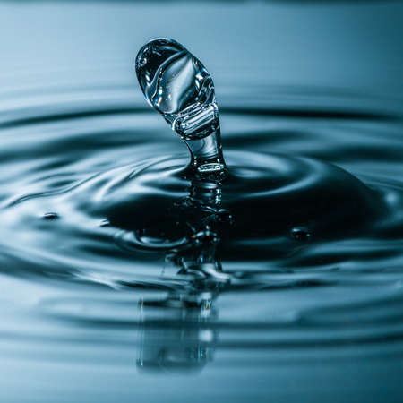 A macro shot of a water splash.の写真素材