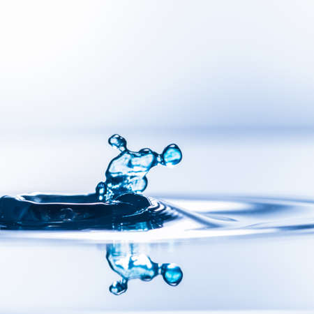 An abstract macro shot of a water drop collision.