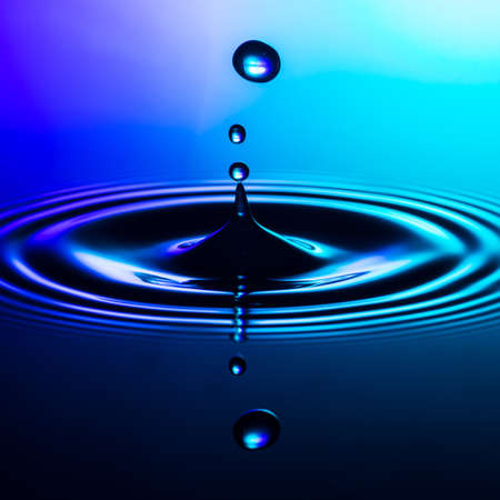 An abstract macro shot of a water drop collision.