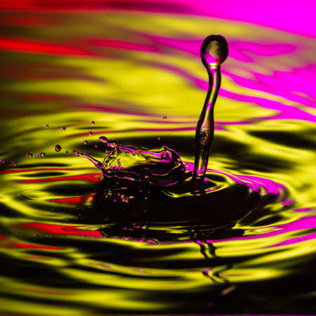 An abstract macro shot of a water drop splash.