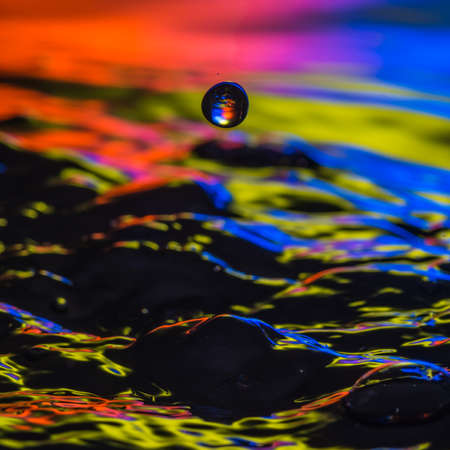 An abstract macro shot of some colourful water.の写真素材