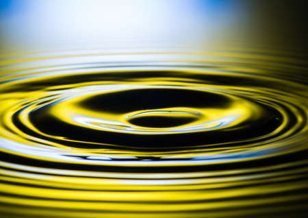 An abstract macro shot of some water ripples.の写真素材
