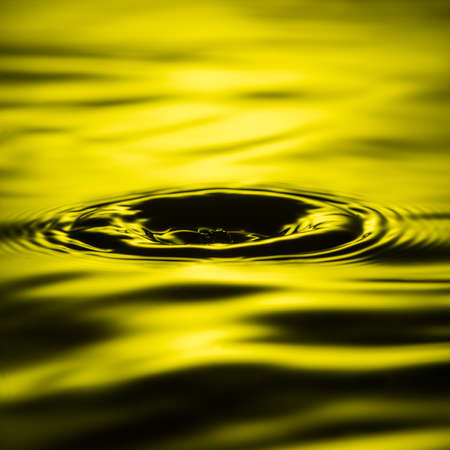 an abstract macro shot of some rippling water.の写真素材
