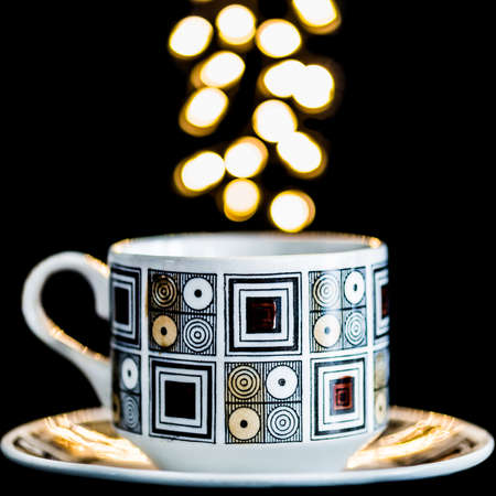 A macro shot of a cup of tea with some steamy bokeh.の写真素材