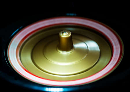 A macro shot of a spinning toy roulette wheel.の写真素材