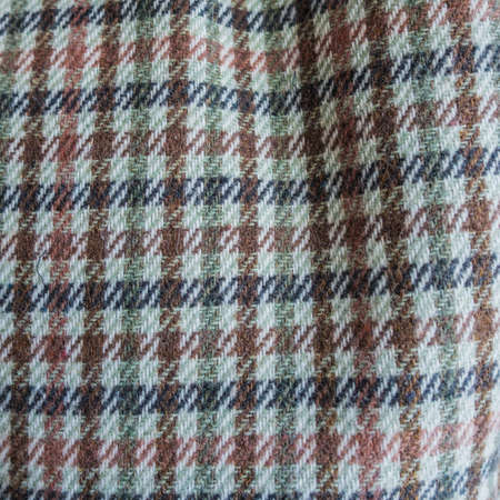 A macro shot of the pattern of a cloth cap.