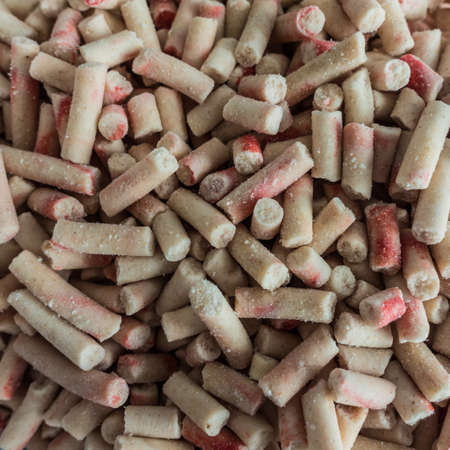 A macro shot of some bird food pellets.