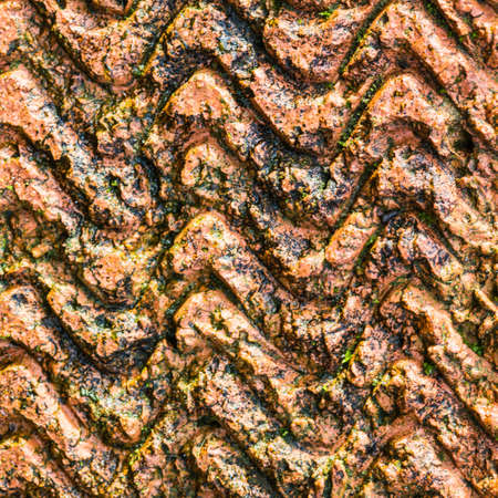 An abstract macro shot of the pattern made on the side of a brick.