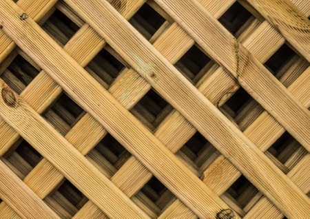 An abstract shot of a wooden garden trellis.の写真素材
