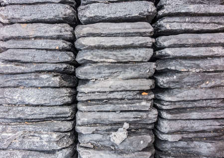 An abstract shot of the edges of some slate tiles.の写真素材