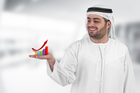 arabian businessman with a chart diagram presentation の写真素材