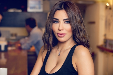 Beautiful woman posing in the pub  の写真素材