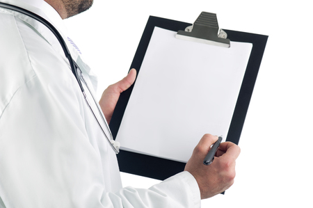 Close-up of a doctor with clipboard isolated on white backgroundの写真素材