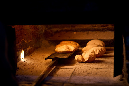 Fresh arabic bread directly from the ovenの写真素材