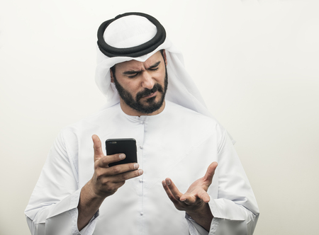 Angry Arabian Businessman, Arabian Businessman expressing anger on the phoneの写真素材