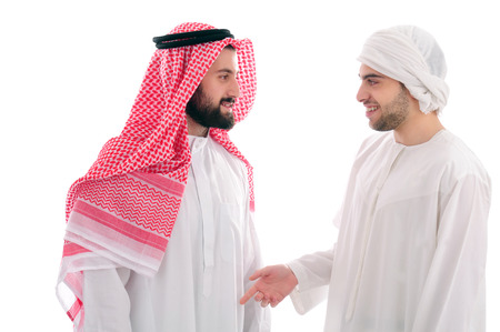 Two Young Arabian Businessmen discussing work over a white background, business conceptの写真素材
