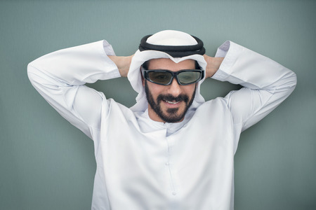 Arabian man wearing 3d glassesの写真素材