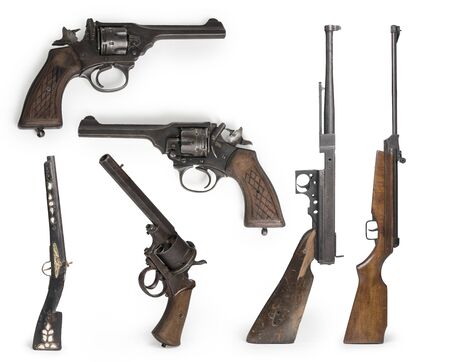 Set of Vintage wooden hunting rifle & Pistol isolated on white background

