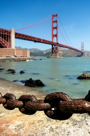 Rusty old chain in view point area near a base of golden gate bridge