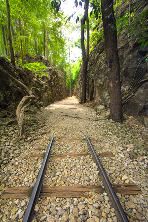 Kanchanaburi, Thailand - Jun 27, 2014  Old iron rail set in historic area as a symbolic のeditorial素材