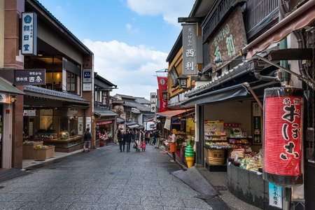 Kyoto, Japan- March 2, 2015 : Unidentify tourists walk through shopping street to visit Kiyomizu-dera temple in Kyoto city, Japanのeditorial素材