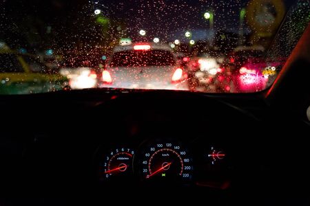 A traffic jam in a rainy season, View from car seat.の写真素材