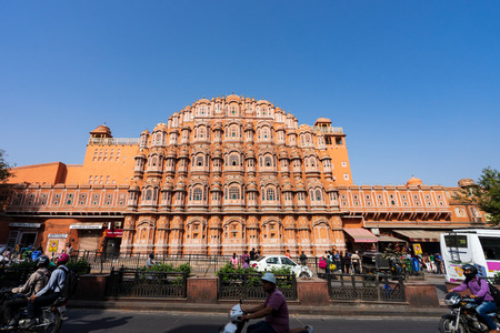 JAIPUR, RAJASTHAN, INDIA- FEB 22, 2018: Front facade of Hawa Mahal palace (Palace of the Winds) view from opposite walkway.のeditorial素材