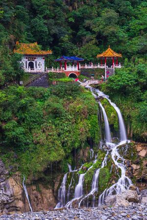 Hualien, Taiwan : March 9, 2019 - Changchun temple,  a chinese traditional architecture with eternal spring shrine and waterfall at Taroko national park.のeditorial素材