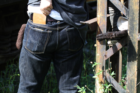 folded men's denim jeansの写真素材