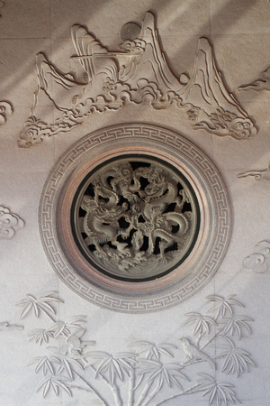 Twice dragon marble carving wall, Decorative Chinese art style at Chinese public templeの写真素材