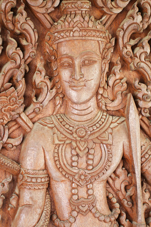 Thai wooden craft male angel statueの写真素材