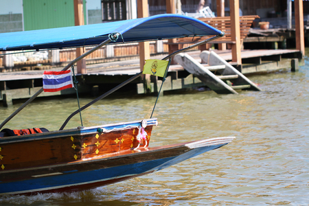 Floating market in Bangkok, tourists boat trip in river of Thailandの写真素材