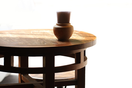 wooden dark brown chairs and table isolated in white backgroundの写真素材