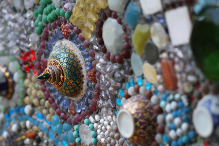 close-up art design of the colorful broken tile, bead, bowl lid and stone decorating for abstract art interior wallpaperの写真素材