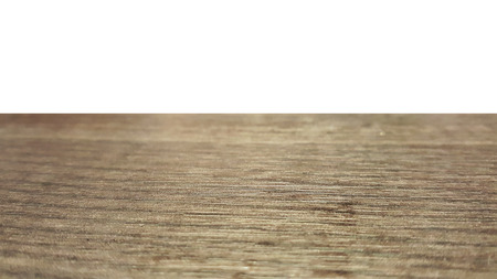 Empty wooden table for product placement with white background for restaurantの写真素材
