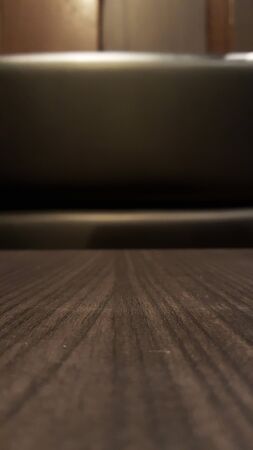 Empty wooden table for product placement in restaurantの写真素材